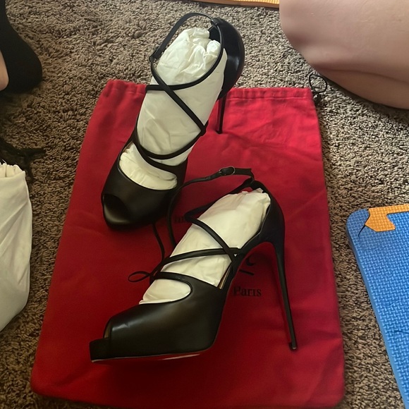 Christian Louboutin red bottom heels. - Picture 2 of 11